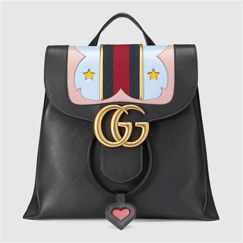 gucci gg stud pochette|Gucci marmont leather backpack.